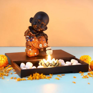Buddha Monk Sitting with T light holder and Pebbles